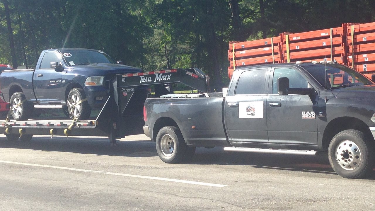 Ram 3500 Cummins diesel towing a trailer on the highway