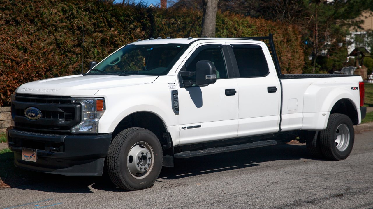 White 2022 Ford F-350 Super Duty diesel with dual rear wheels viewed from the front