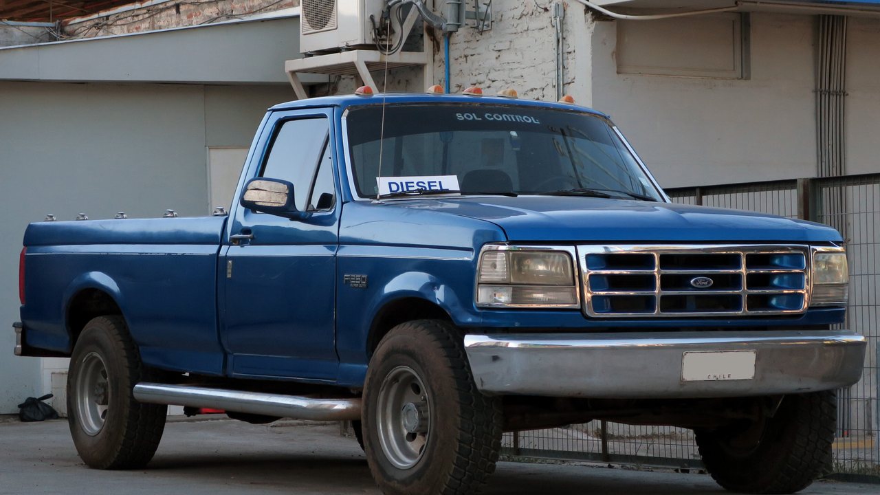 Blue 1996 Ford F-250 equipped with a 7.3-liter diesel