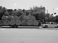 Ford F-350 diesel dually hauling hay on a road in Hillsboro, Texas