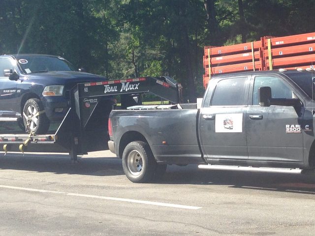 Ram 3500 Cummins diesel towing a trailer on the highway