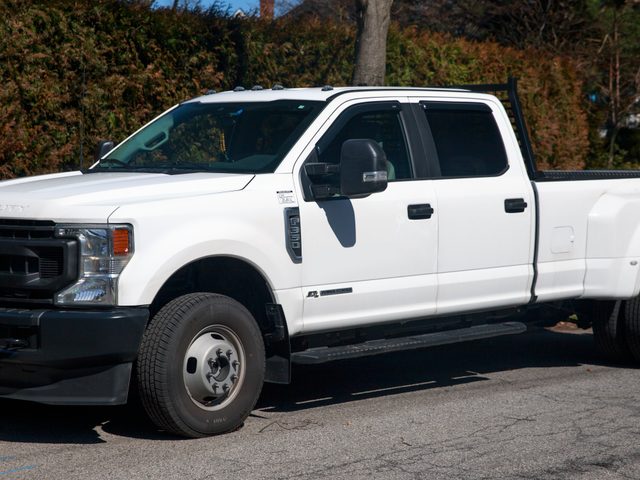 White 2022 Ford F-350 Super Duty diesel with dual rear wheels viewed from the front