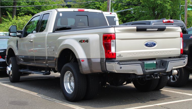 Rear view of a 2018 Ford F-350 Power Stroke dually showing its dual rear wheels