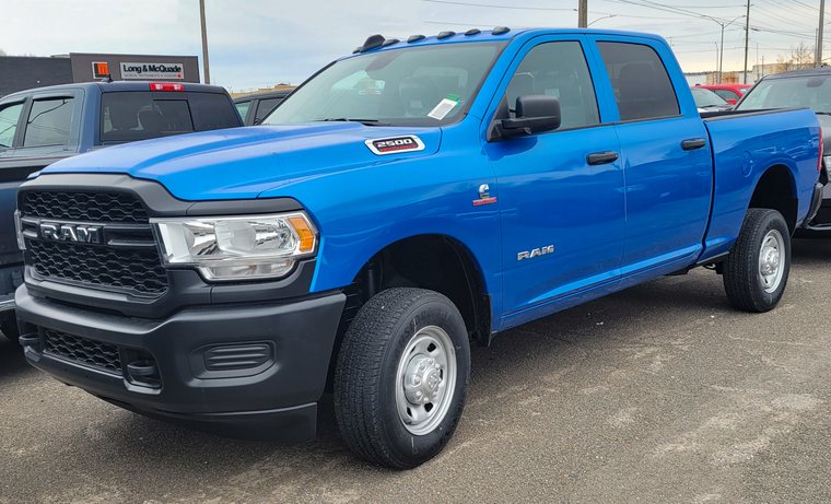Blue 2022 Ram 2500 Cummins diesel with a single-rear-wheel axle
