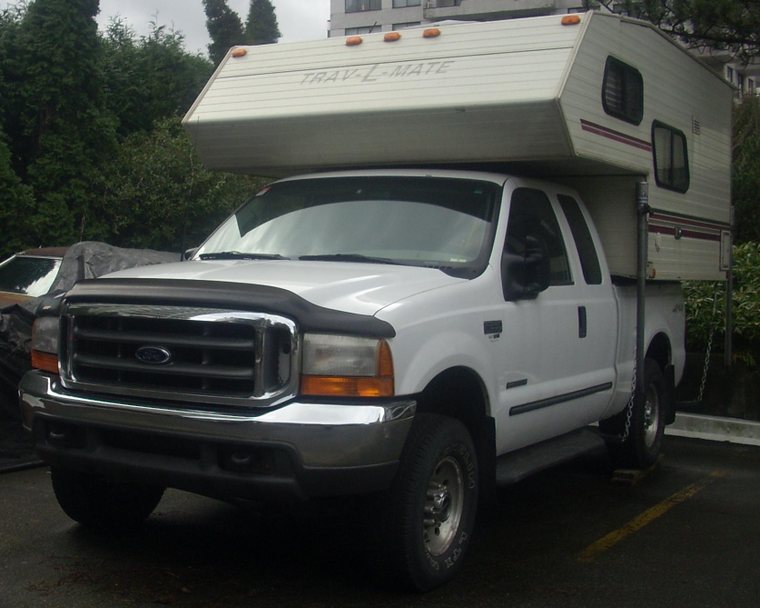 Ford F-250 Super Duty diesel carrying a slide-in camper