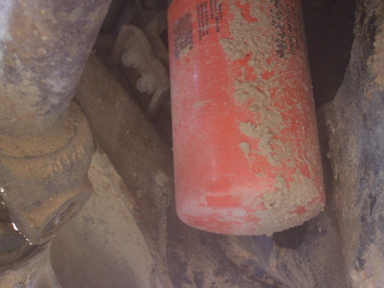 Oil filter mounted underneath a Ford F-250 7.3-liter diesel engine