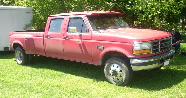 Red OBS Ford F-350 crew-cab dually with a Power Stroke diesel